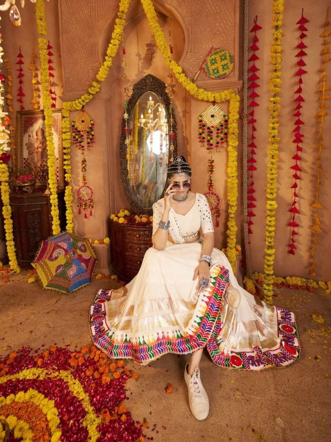 IVORY NAVRATRI LEHENGA CHOLI WITH FESTIVE BORDER
